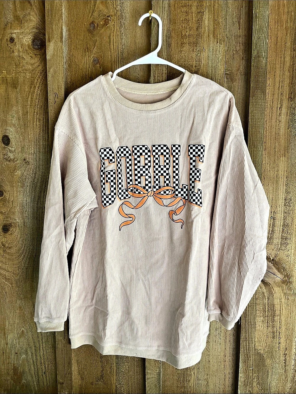Graphic Long Sleeve Top in Pink Size Small